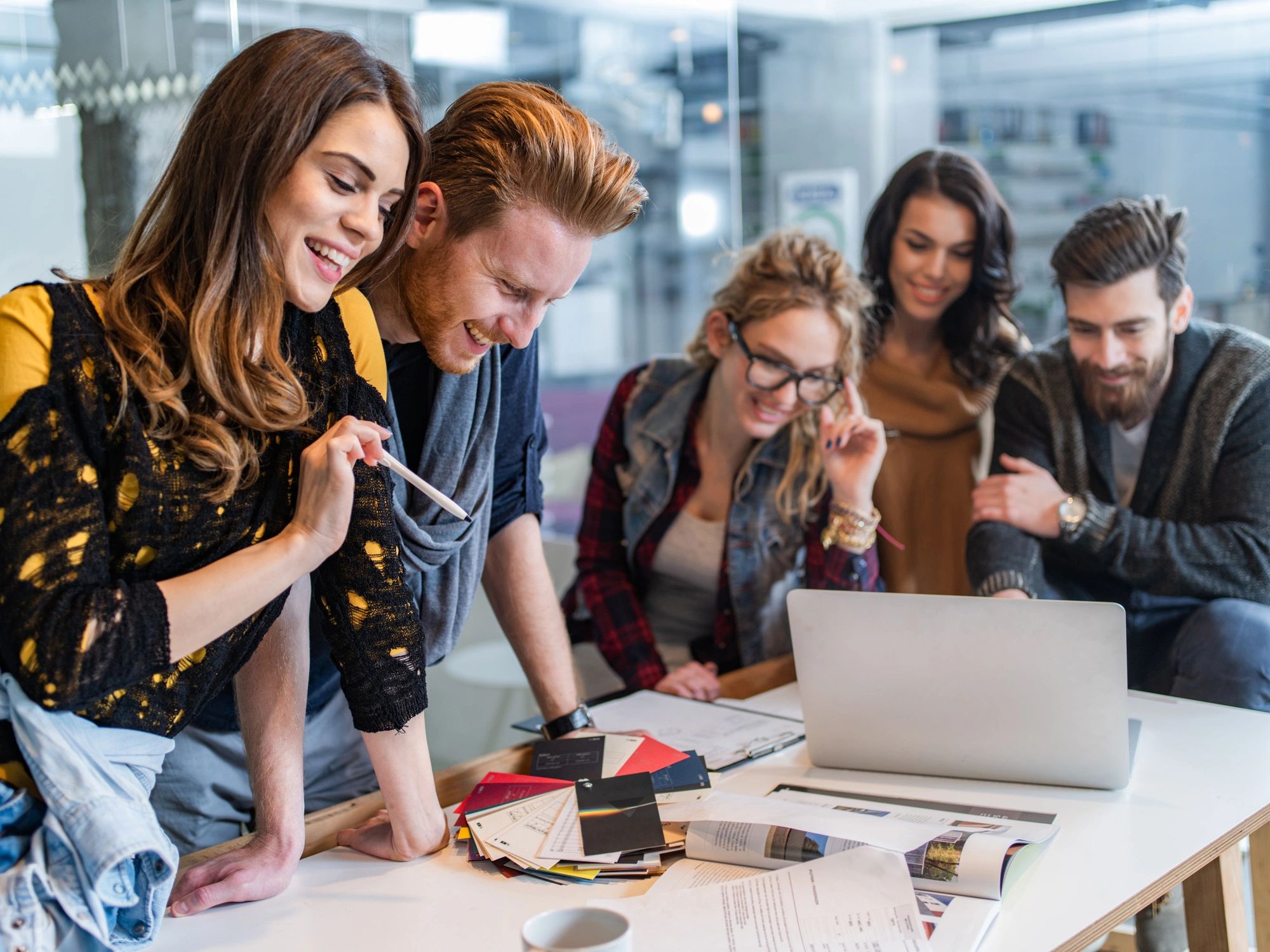 Web design team collaborating in a modern office
